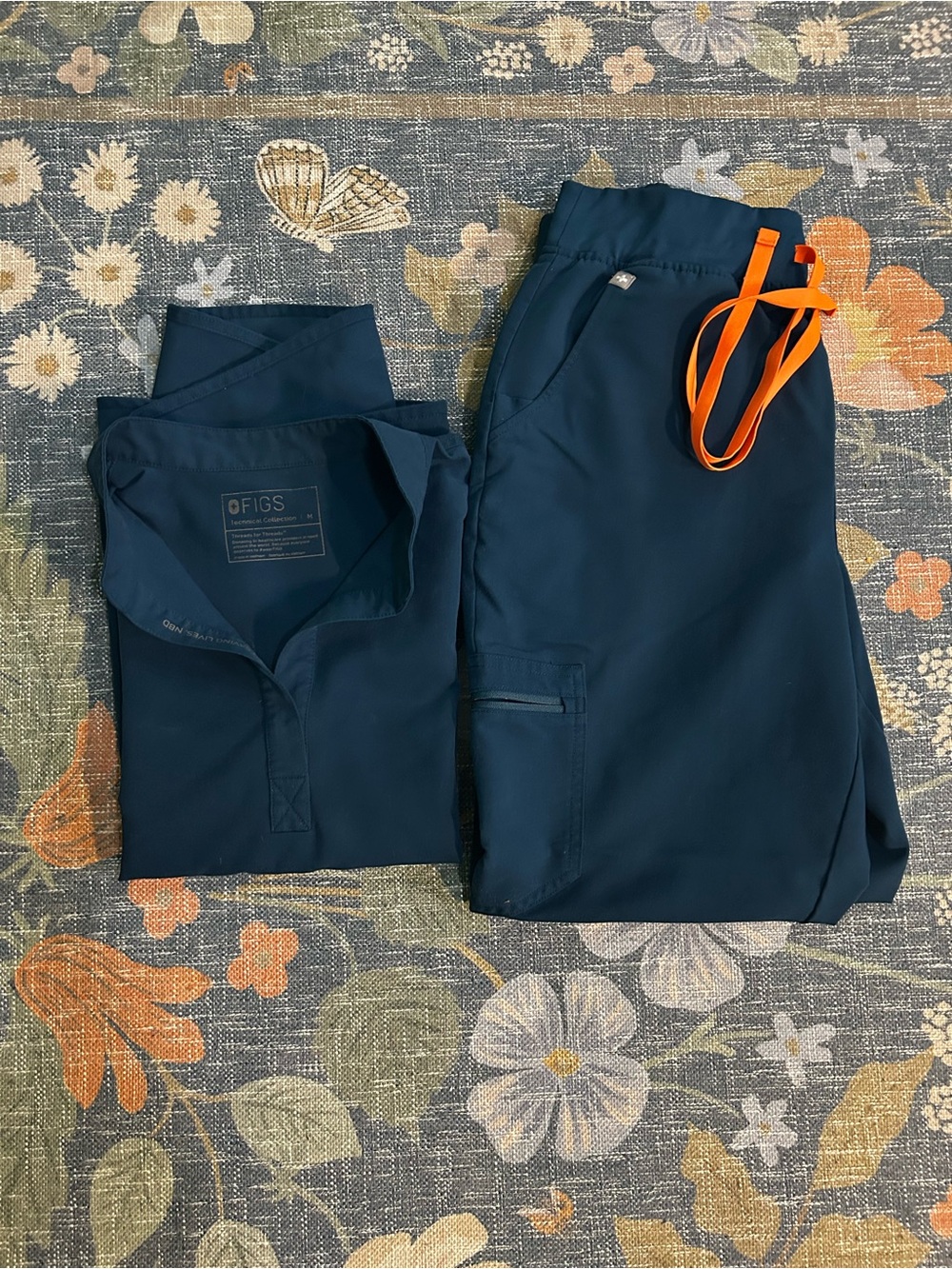 Figs women’s Navy Jogger Scrub Pants with Orange Drawstring